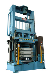 Low ceiling expander with rotary table load-offload station (Ball screw drive ram)